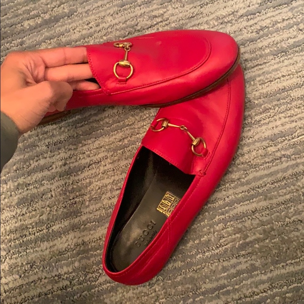 Red Gucci flat loafers